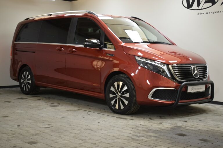 Red Mercedes-Benz van parked indoors on a tiled floor, angled to show the front and side views.